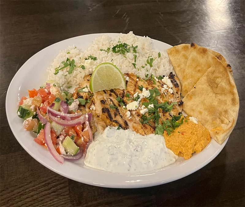 Greek chicken platter at Blū Restaurant