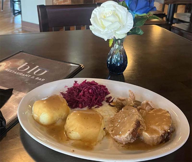 Pork with potatoes at Blū Restaurant