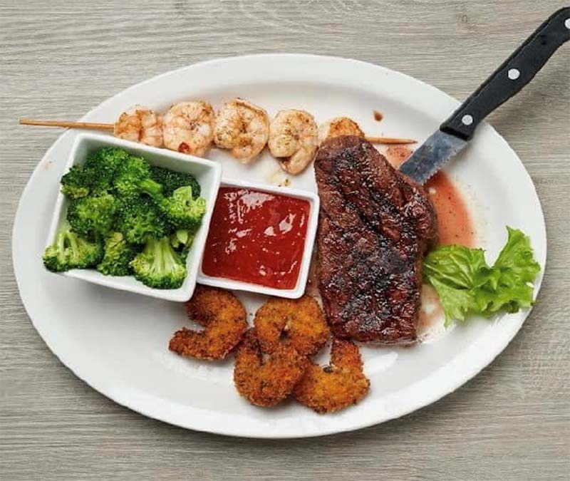 Steak, shrimp and vegetables at Blū Restaurant